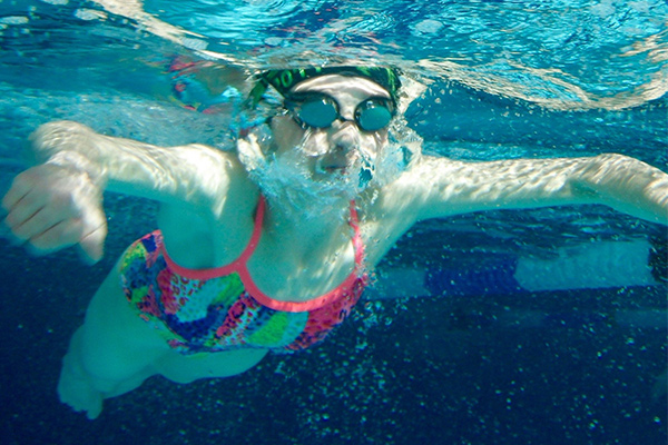 Amelia swimming breaststroke
